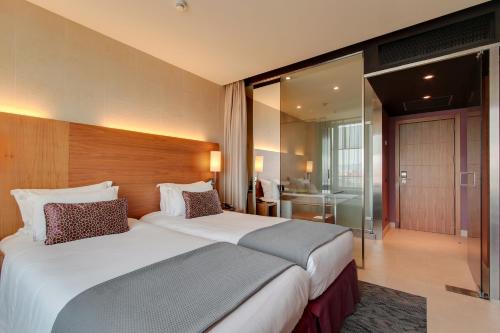 Habitación Doble con cama supletoria del hotel Badalona Tower