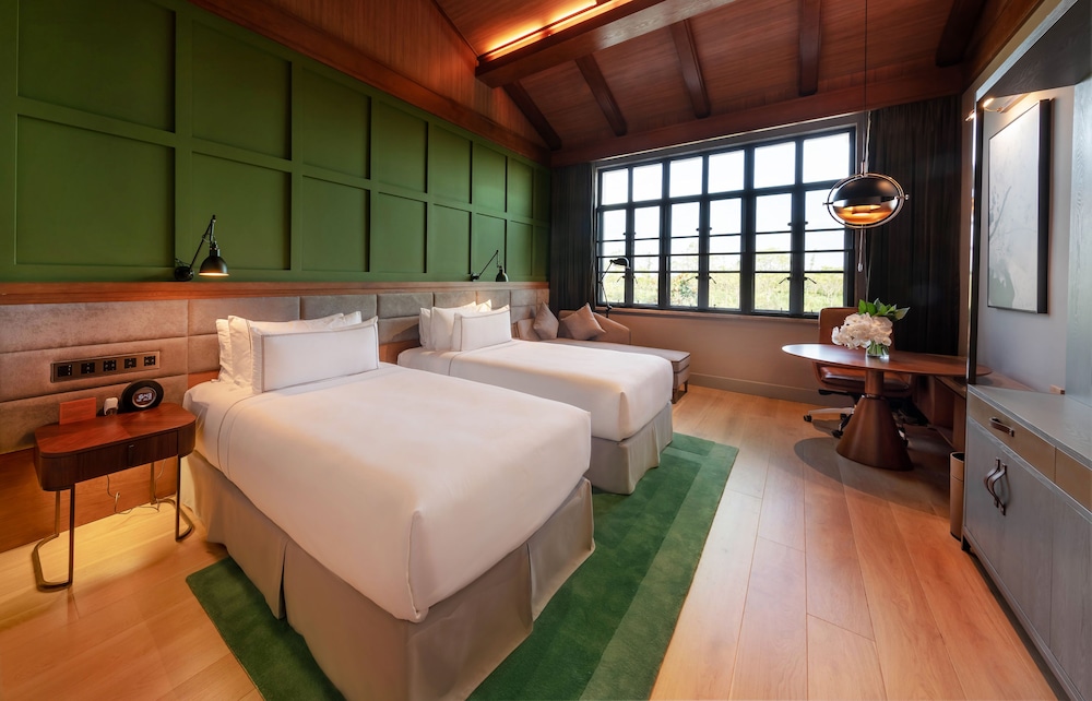 Habitación Deluxe con vistas al jardín del hotel Melia Shanghai Parkside