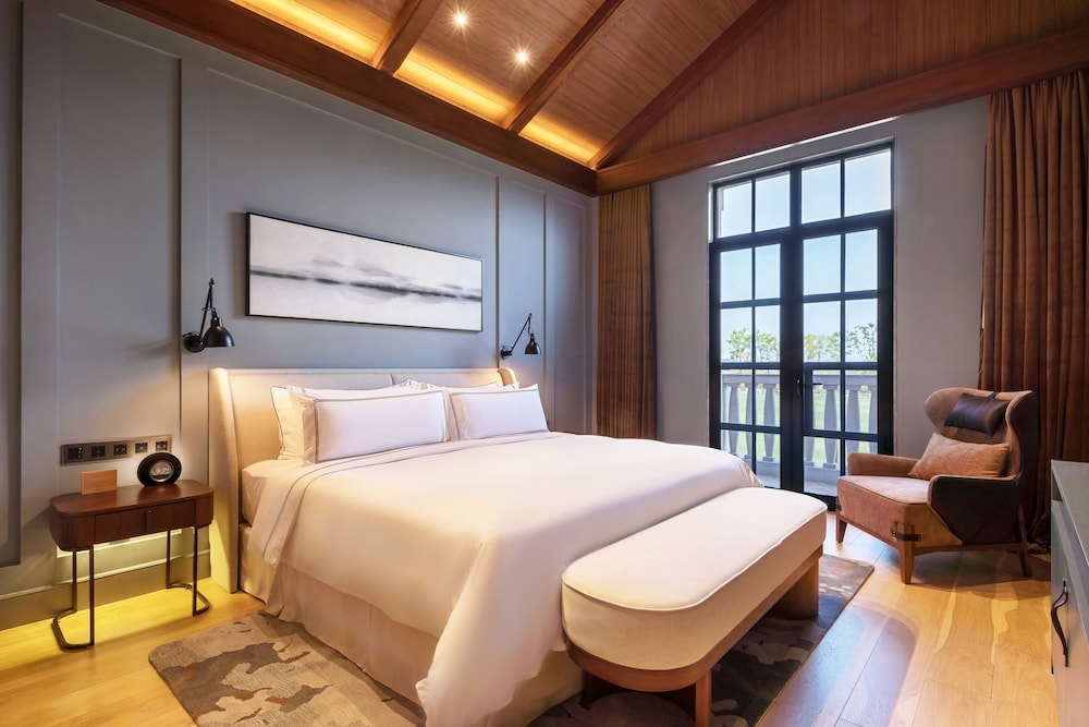 Suite con vistas al jardín del hotel Melia Shanghai Parkside