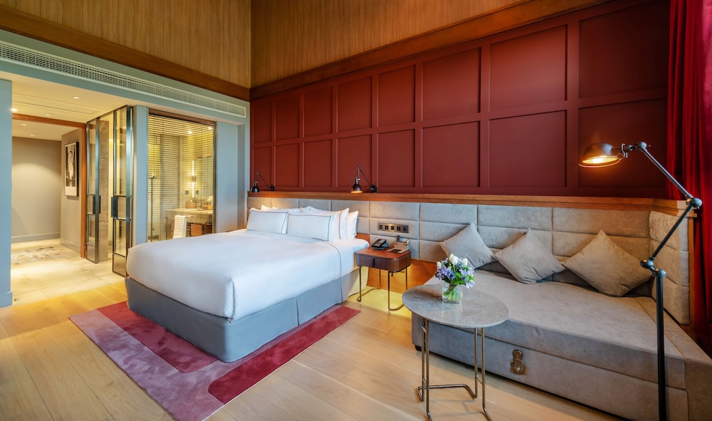 Habitación Deluxe con terraza y vistas al jardín del hotel Melia Shanghai Parkside