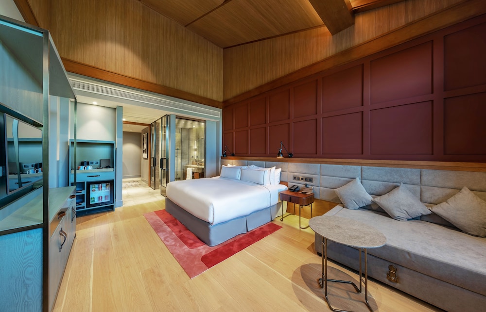 Habitación Deluxe con terraza y vistas al jardín del hotel Melia Shanghai Parkside. Foto 1