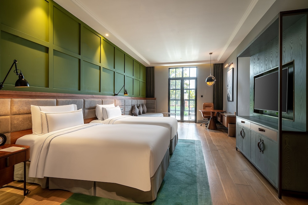 Habitación Premium con terraza y vistas al jardín del hotel Melia Shanghai Parkside. Foto 3