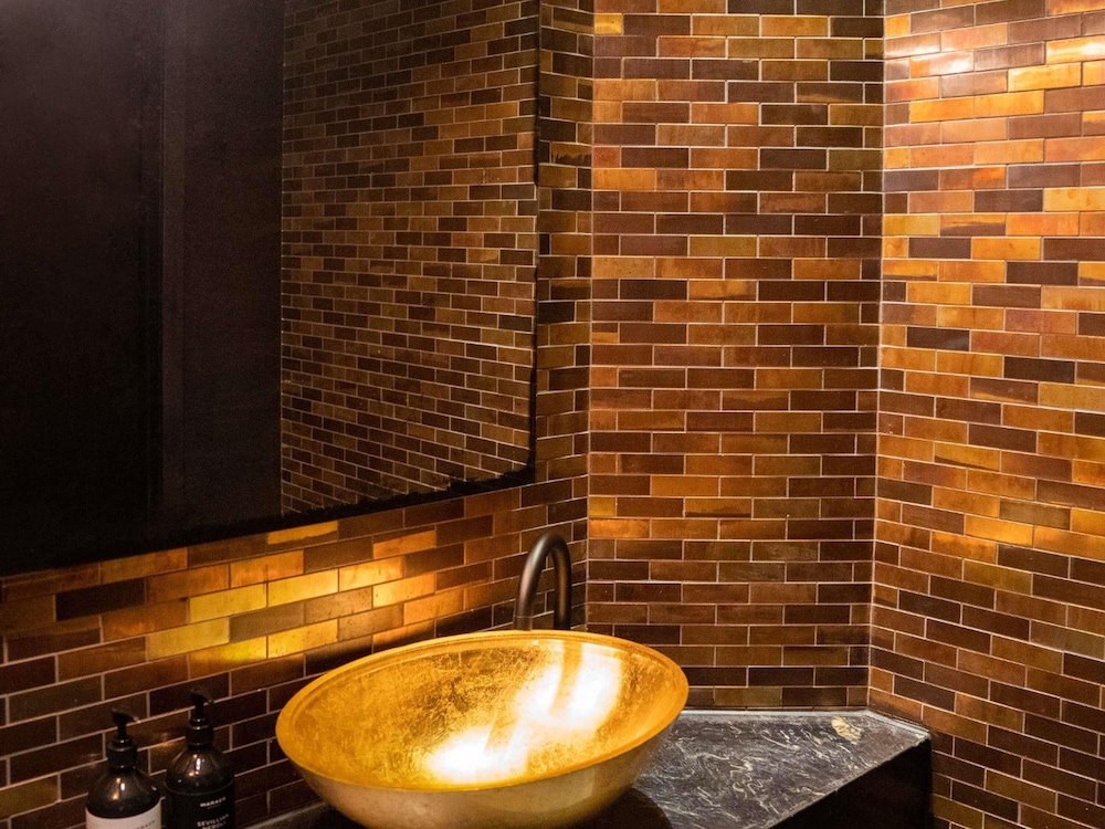 ATELIER SUITE, Acceso Club Signature, 1 Cama King del hotel So/ Auckland. Foto 7