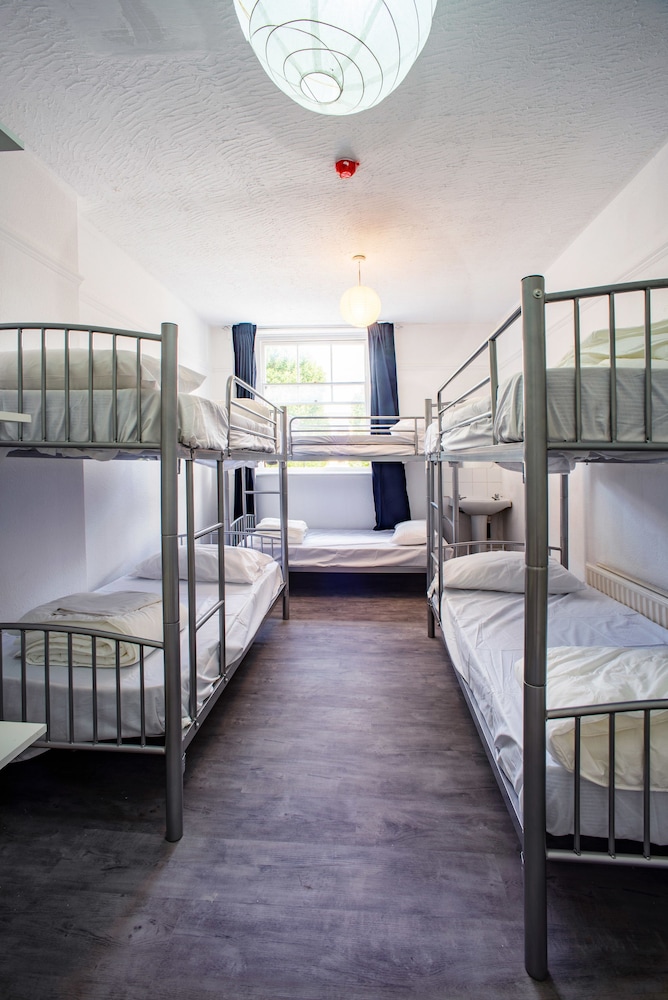Dormitorio compartido, dormitorio mixto, baño compartido (8 - Beds Dorm with Shared Bathroom) del hotel Mile End Beds - Hostel. Foto 2