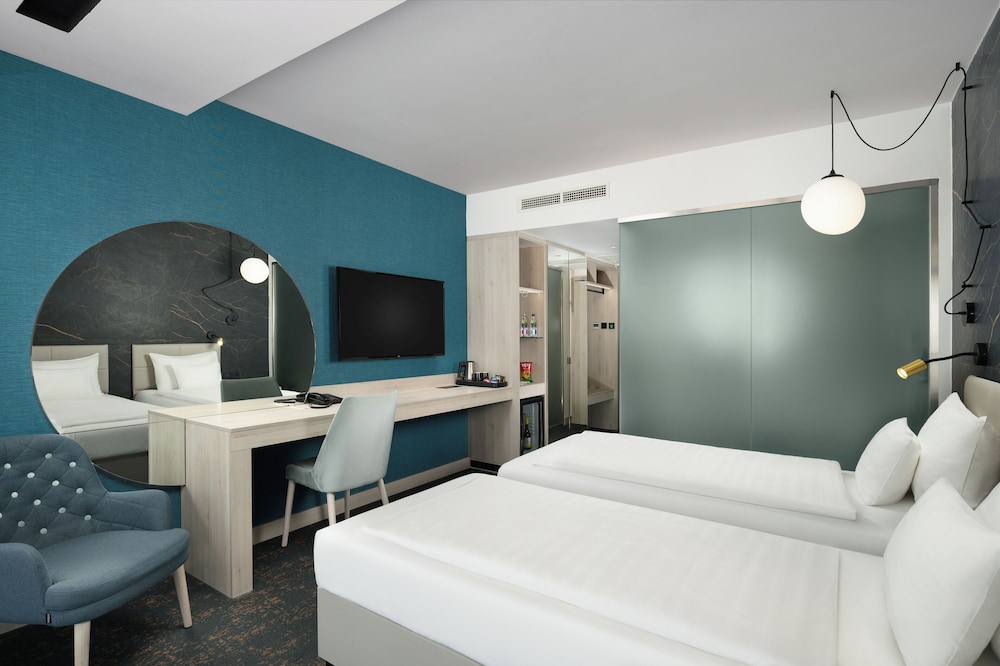 Habitación Standard con 2 camas individuales del hotel Mercure Tokaj Center. Foto 1