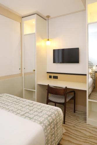 Habitación Doble Clásica Pequeña del hotel Five Boutique Paris Quartier Latin. Foto 2