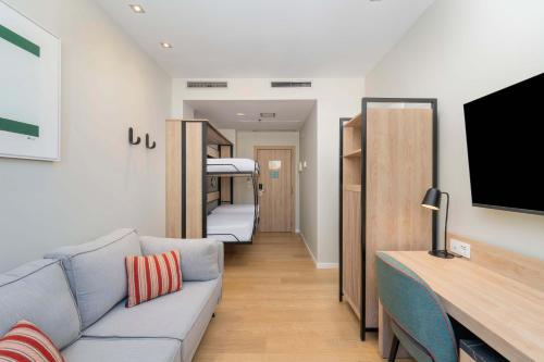 Suite Vista ciudad Sofá Cama incluido 1 Cama doble del hotel and Spa Villa Olímpic@ Suites. Foto 6
