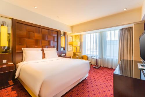 Suite Deluxe del hotel Beijing Pudi. Foto 3