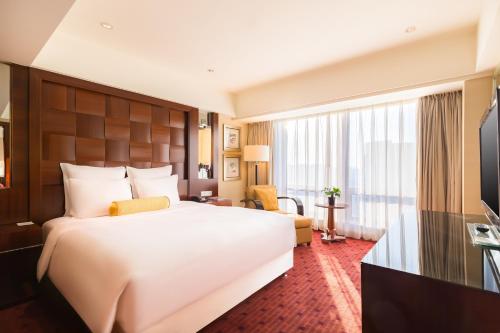 Suite Executive del hotel Beijing Pudi. Foto 1