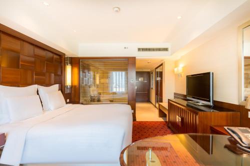 Habitación Doble Superior del hotel Beijing Pudi. Foto 2