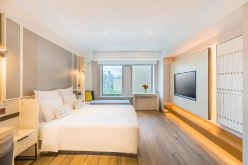 Fun Enjoy Superior Double Room del hotel Beijing Pudi. Foto 1
