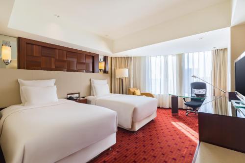 Oferta por tiempo limitado - Habitación Doble Superior - 2 camas del hotel Beijing Pudi. Foto 2