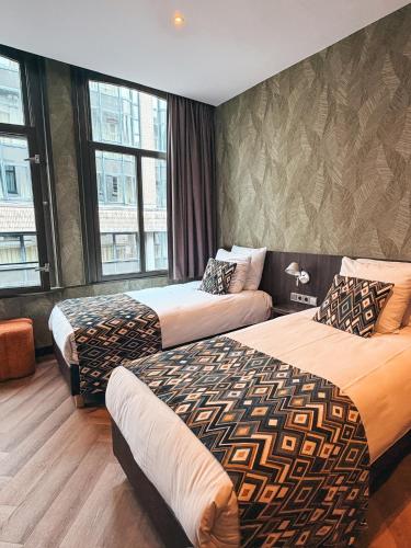 Habitación Cuádruple del hotel Damsquare