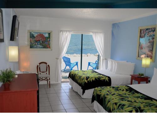 Habitación con 2 camas dobles - Frente a la playa del hotel Ibis Bay Beach Resort. Foto 1