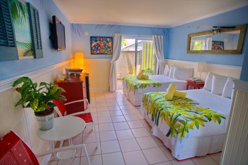 Habitación con 2 camas dobles del hotel Ibis Bay Beach Resort