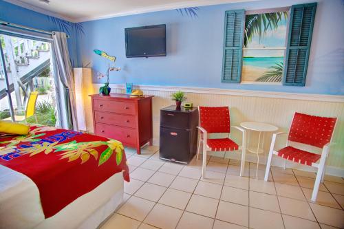 Habitación con 2 camas dobles del hotel Ibis Bay Beach Resort. Foto 1