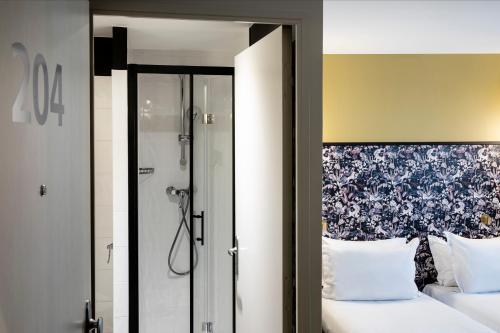 Habitación Doble - 2 camas del hotel Paris La Fayette. Foto 9