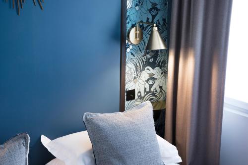 Habitación Triple del hotel Paris La Fayette. Foto 1