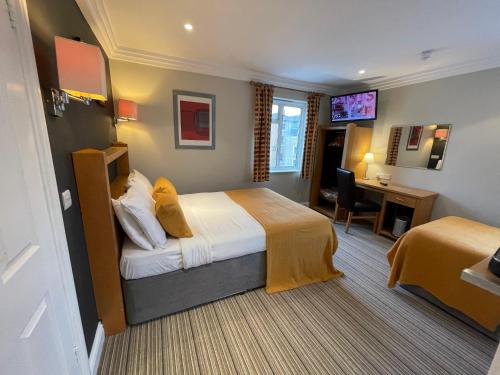 Habitación Triple Estándar del hotel Shandon. Foto 4