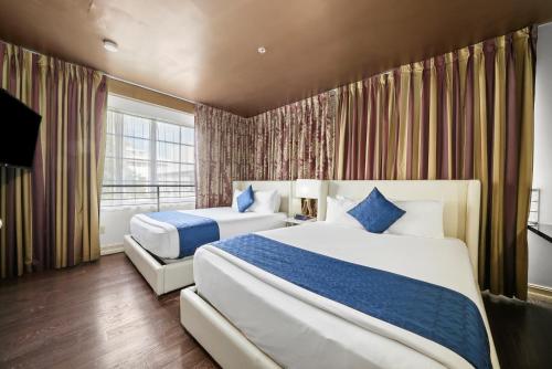 Suite Doble Deluxe de 1 dormitorio con cama grande del hotel Riviera South Beach, A South Beach Group. Foto 3
