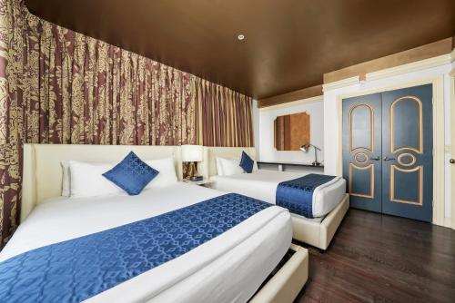 Suite Doble Deluxe de 1 dormitorio con cama grande del hotel Riviera South Beach, A South Beach Group. Foto 5