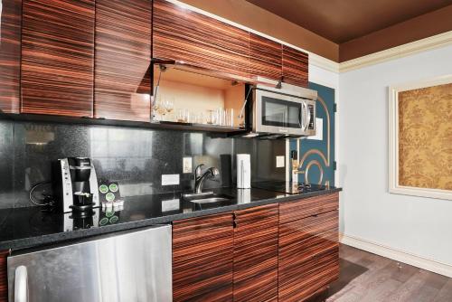 Suite Doble Deluxe de 1 dormitorio con cama grande del hotel Riviera South Beach, A South Beach Group. Foto 7