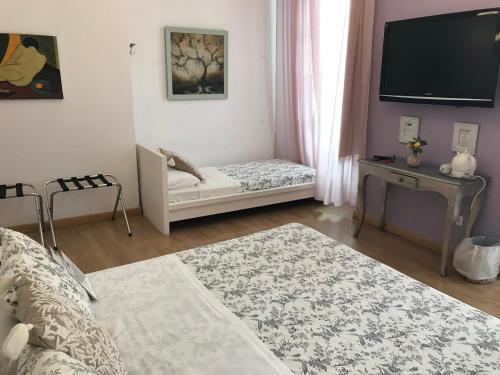 Habitación Doble Deluxe con cama supletoria del hotel Un Patio Al Sur. Foto 5