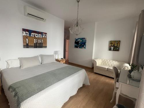 Habitación Doble Deluxe con balcón del hotel Un Patio Al Sur. Foto 2