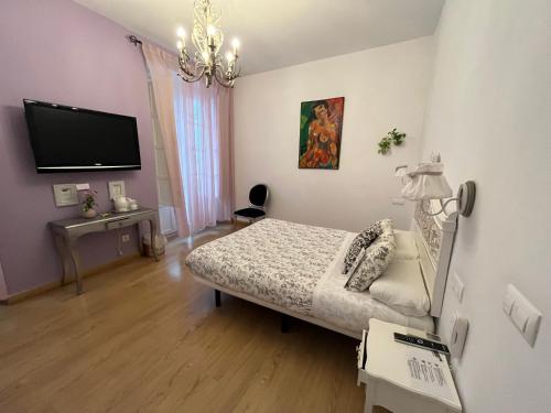 Habitación Doble Deluxe con cama supletoria del hotel Un Patio Al Sur. Foto 4