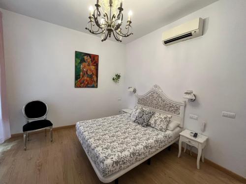 Habitación Doble Deluxe con cama supletoria del hotel Un Patio Al Sur. Foto 8