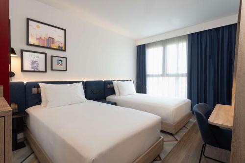 Habitación Doble - 2 camas del hotel Hampton by Hilton Malaga Martiricos. Foto 2
