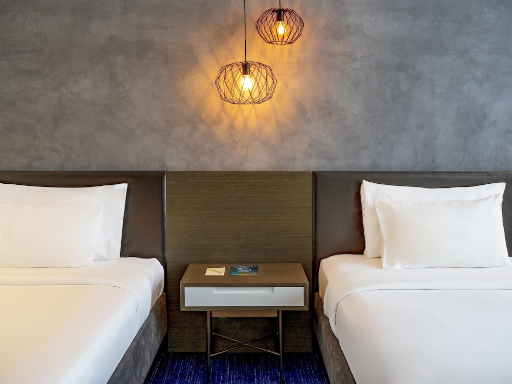 Habitación Superior con Dos Camas Individuales - Vistas a la Ciudad del hotel Pullman Sharjah. Foto 3