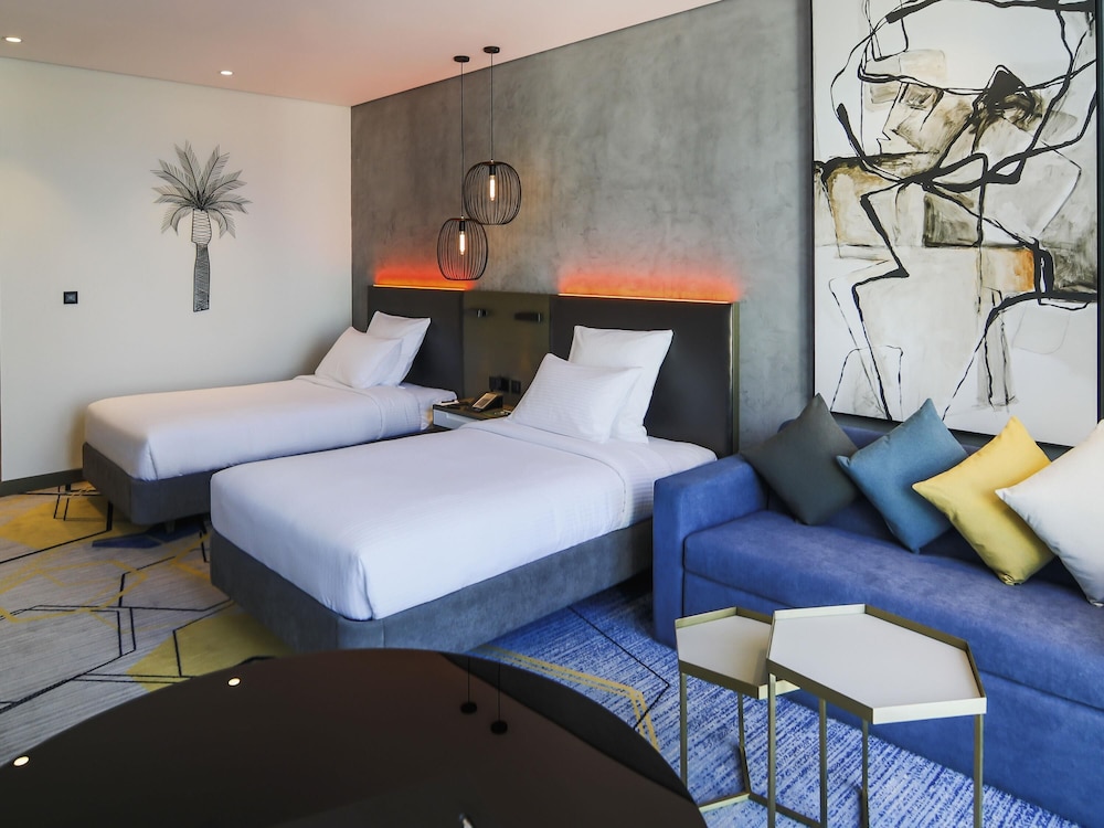 Habitación Deluxe con Dos Camas Individuales - Vistas a la Laguna del hotel Pullman Sharjah