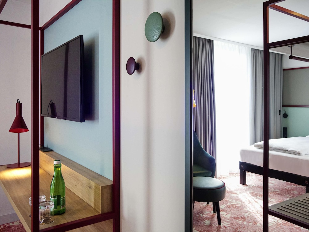 Su habitación con dos camas, Una estancia relajante para dos personas. También con puerta de comunicación del hotel Ibis Styles Klagenfurt Am Woerthersee. Foto 1