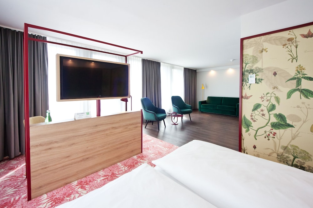 Su habitación familiar, Amplio espacio para hasta cuatro personas del hotel Ibis Styles Klagenfurt Am Woerthersee. Foto 2
