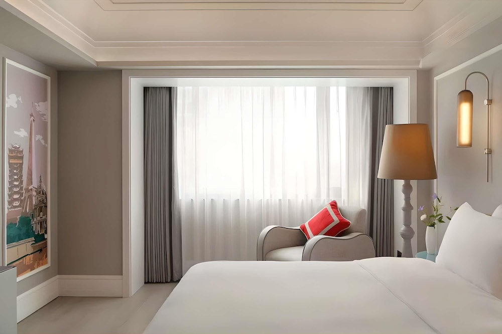 Habitación Deluxe, 1 cama de matrimonio grande del hotel Mercure Chengdu Jinniu Wanda Plaza. Foto 1