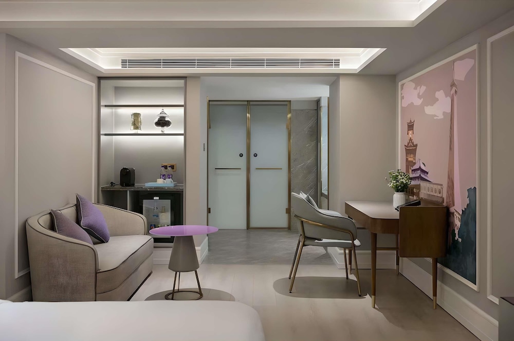 Habitación Deluxe, 1 cama de matrimonio grande del hotel Mercure Chengdu Jinniu Wanda Plaza. Foto 4