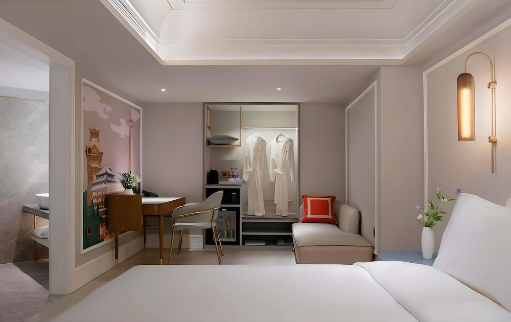 Privilege, Habitación, 1 cama de matrimonio grande del hotel Mercure Chengdu Jinniu Wanda Plaza. Foto 4