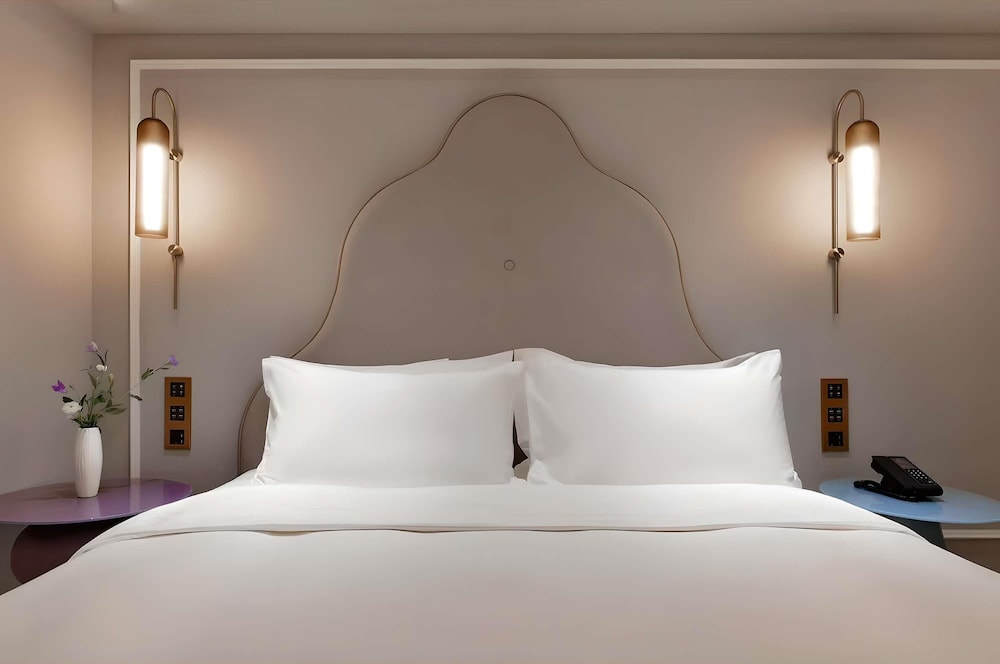 Habitación superior, 1 cama de matrimonio grande del hotel Mercure Chengdu Jinniu Wanda Plaza. Foto 1