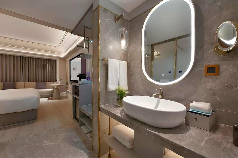 Habitación superior, 1 cama de matrimonio grande del hotel Mercure Chengdu Jinniu Wanda Plaza. Foto 2