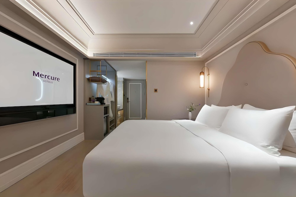 Habitación superior, 1 cama de matrimonio grande del hotel Mercure Chengdu Jinniu Wanda Plaza. Foto 3
