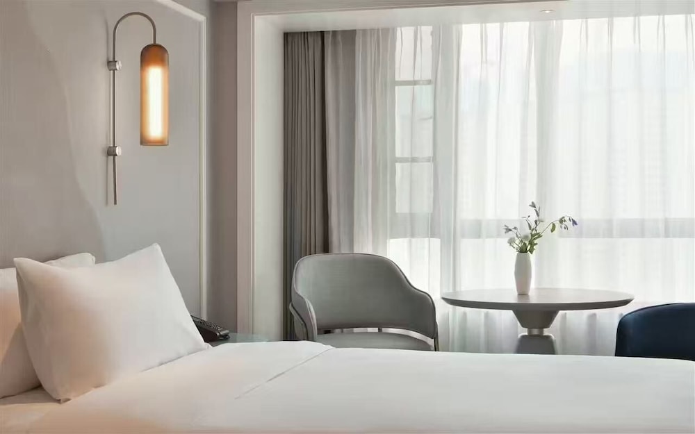 Habitación superior, 2 camas individuales del hotel Mercure Chengdu Jinniu Wanda Plaza. Foto 1