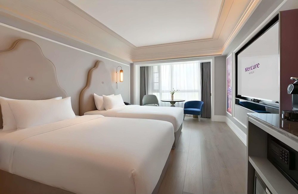 Habitación superior, 2 camas individuales del hotel Mercure Chengdu Jinniu Wanda Plaza. Foto 2