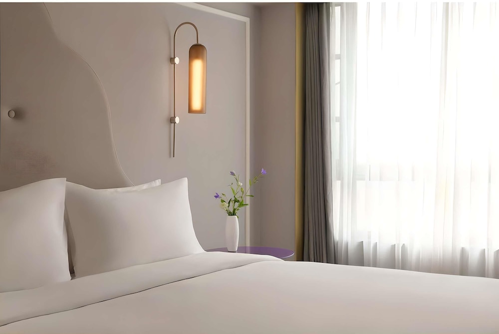 Habitación estándar, 1 cama de matrimonio grande del hotel Mercure Chengdu Jinniu Wanda Plaza. Foto 2