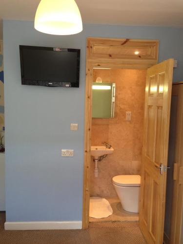 Habitación Cuádruple con baño del hotel Hourglass. Foto 2