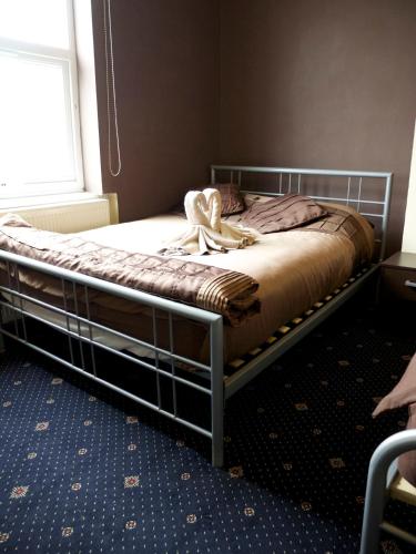 Habitación Triple del hotel Beaconsfield. Foto 1
