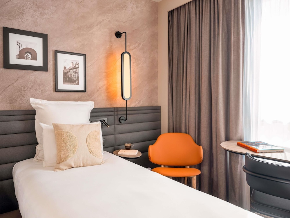 Habitación superior con 2 camas individuales del hotel Novotel Orléans Centre Gare. Foto 3
