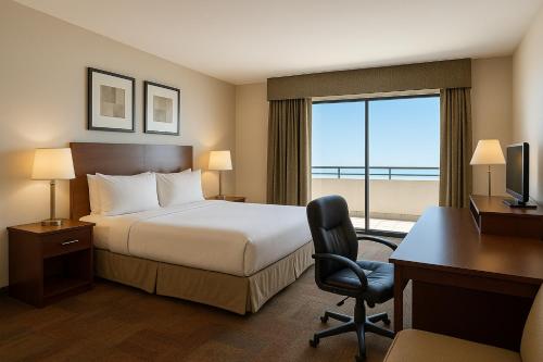 Habitación Deluxe con cama extragrande del hotel Holiday Inn Manhattan View. Foto 4