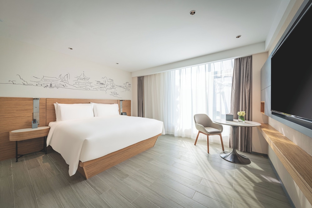 Executive Deluxe King del hotel UrCove by HYATT Nanjing Downtown. Foto 1