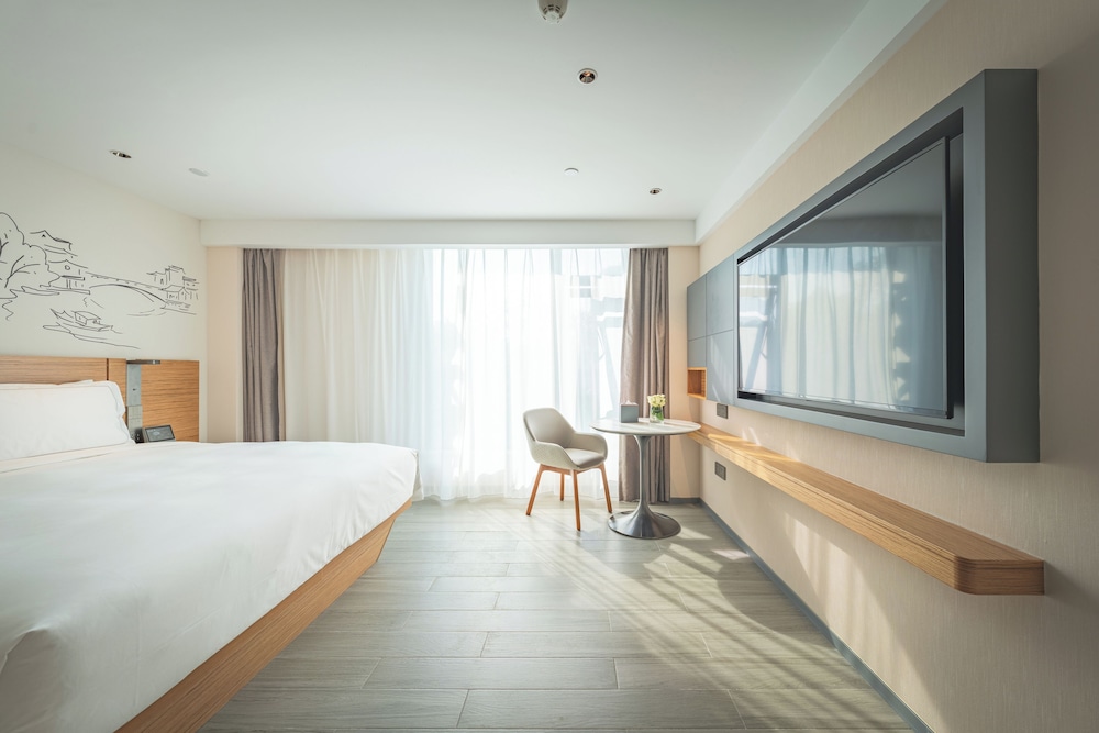 Executive Deluxe King del hotel UrCove by HYATT Nanjing Downtown. Foto 2